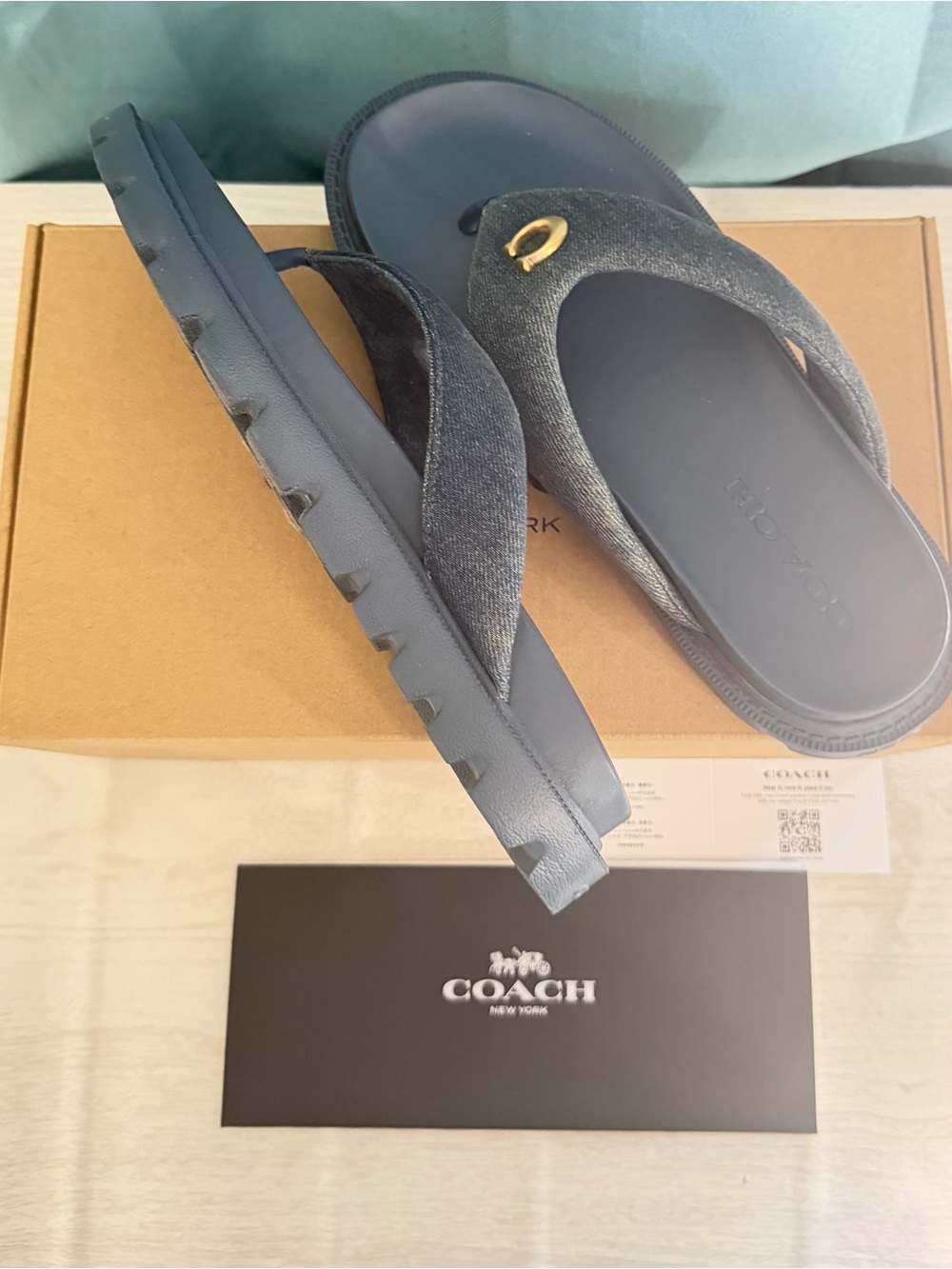 Coach women’s Navy Blue Suede Flip Flops with Gold Accent
